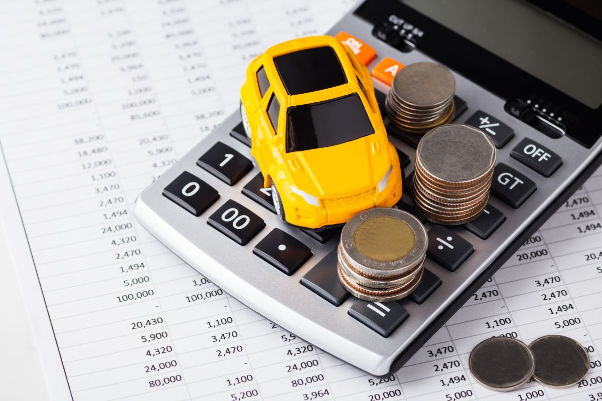 A picture of a toy car and money.