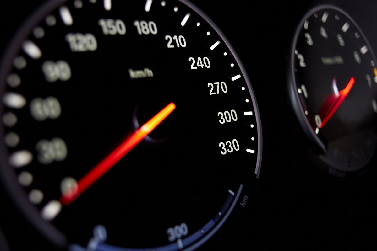 A picture of a car's speedometer.