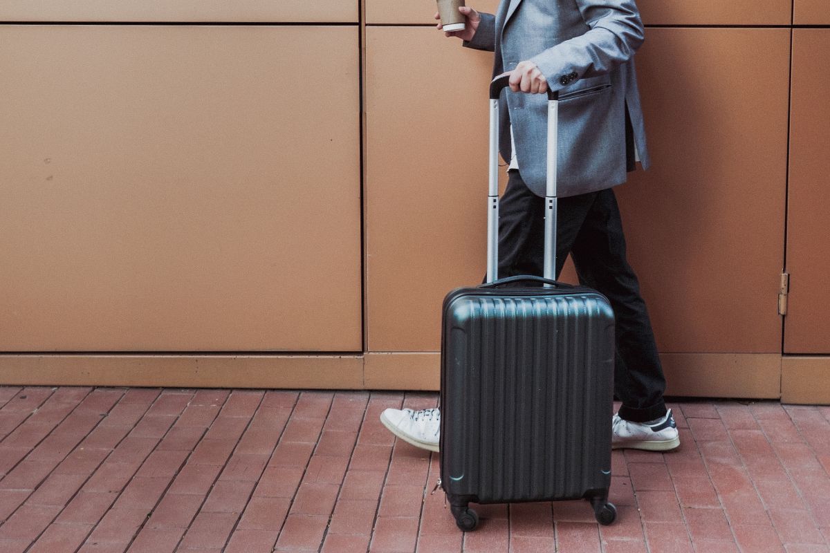 A picture of someone with a baggage.