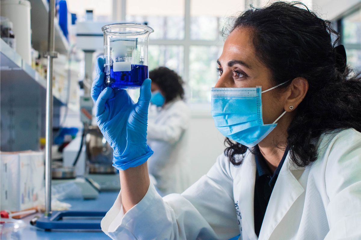 A picture of a woman titrating. 