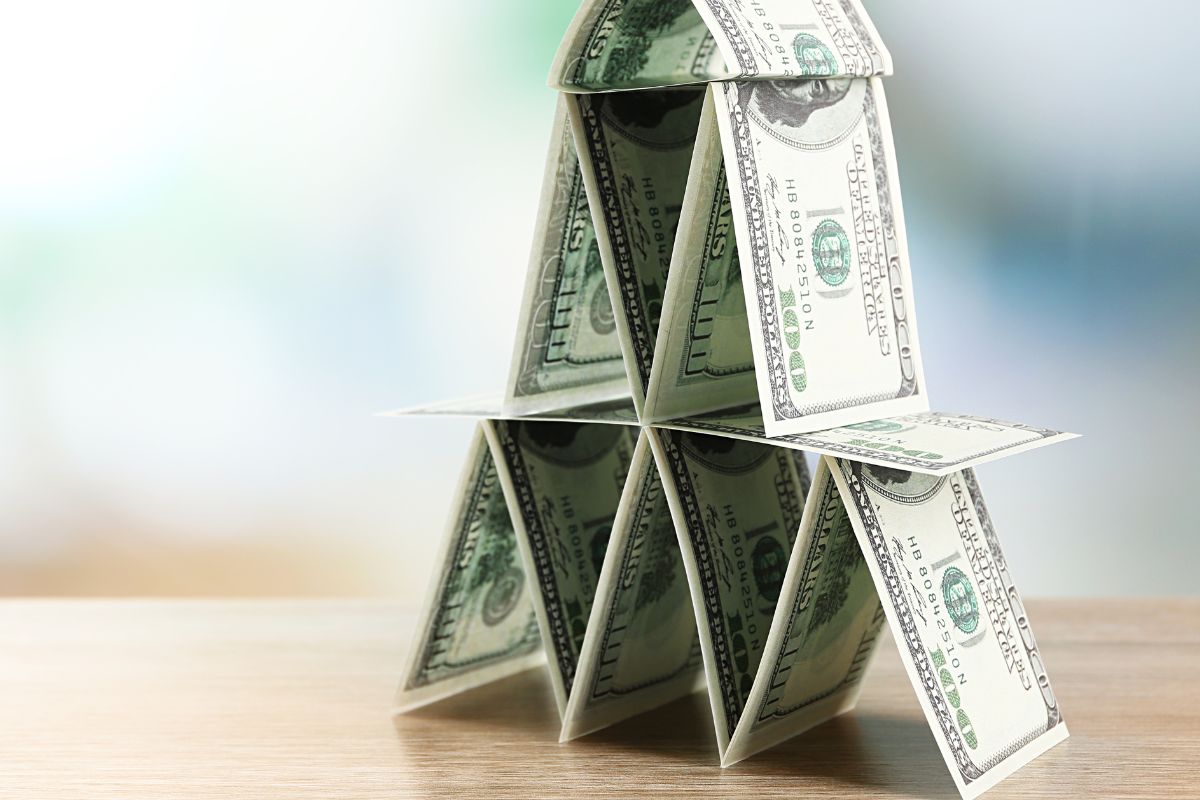 A picture of a tower made from bills.