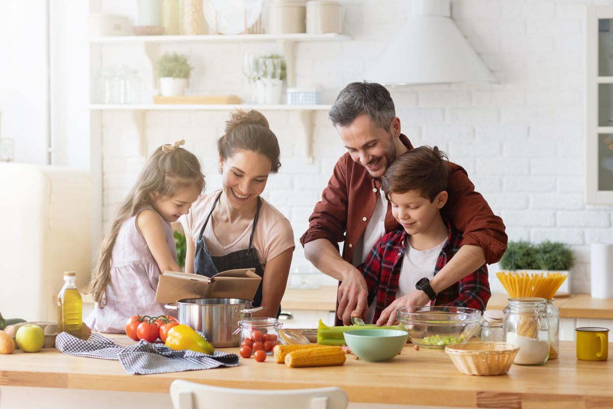 A picture of a family cooking.
