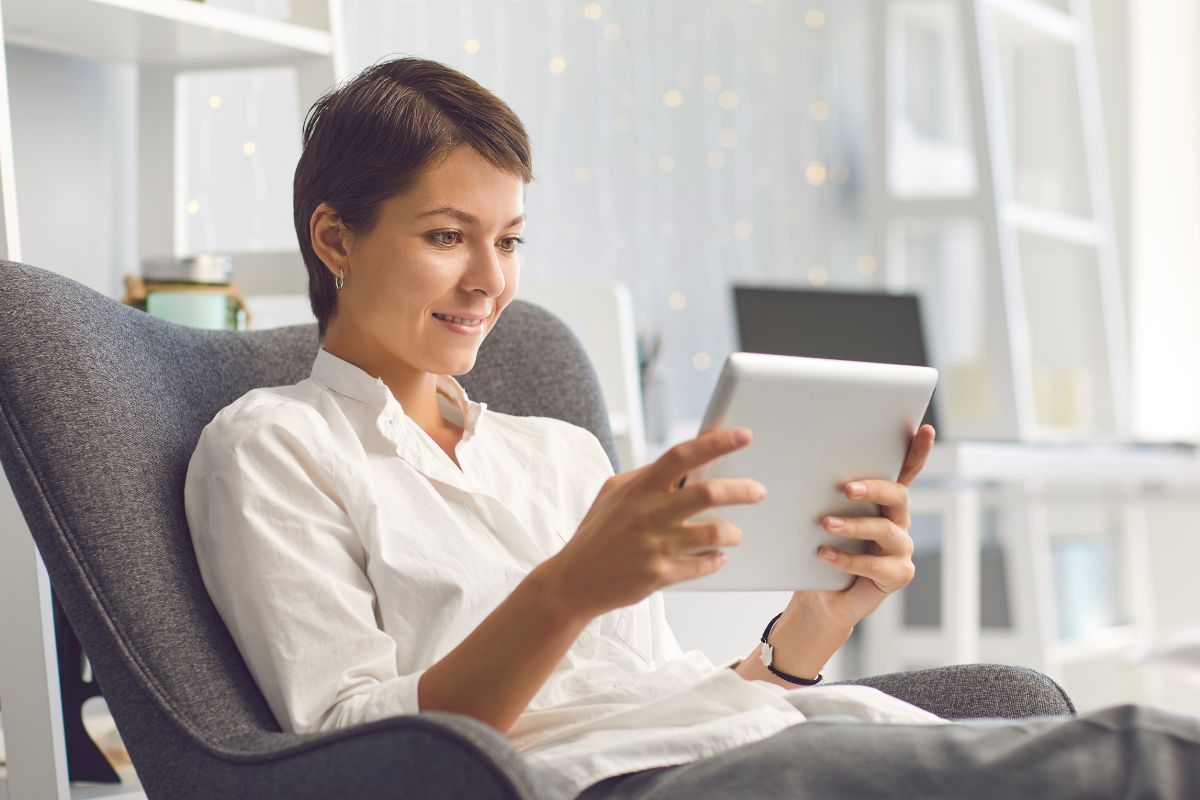 A picture of a lady in her gadget.