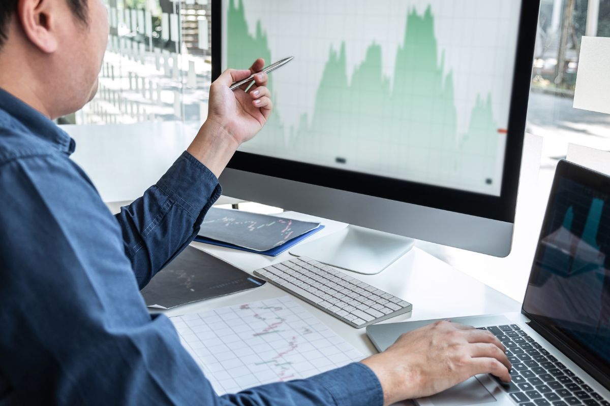 A picture of someone looking at stocks.