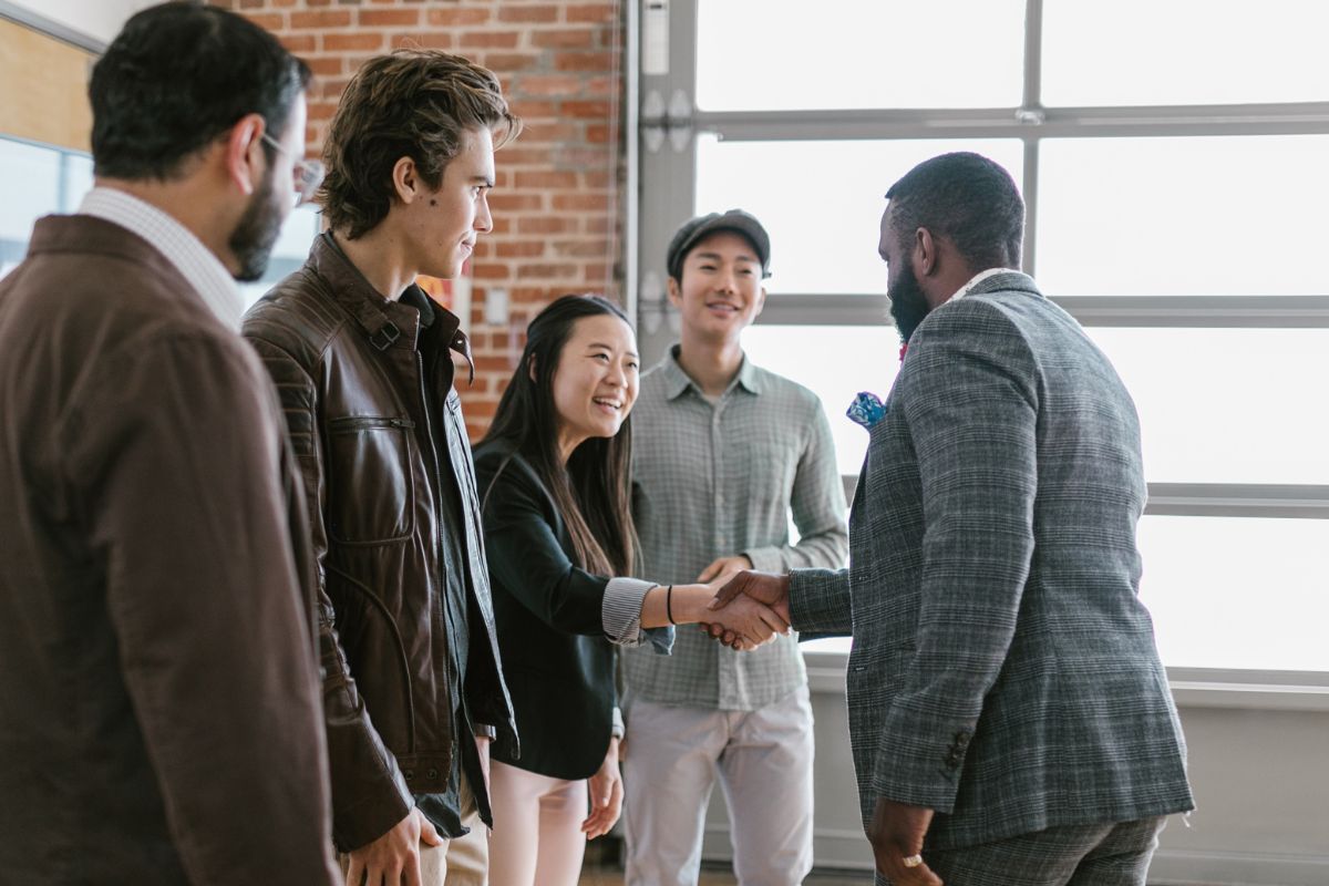 A picture of someone meeting the team.