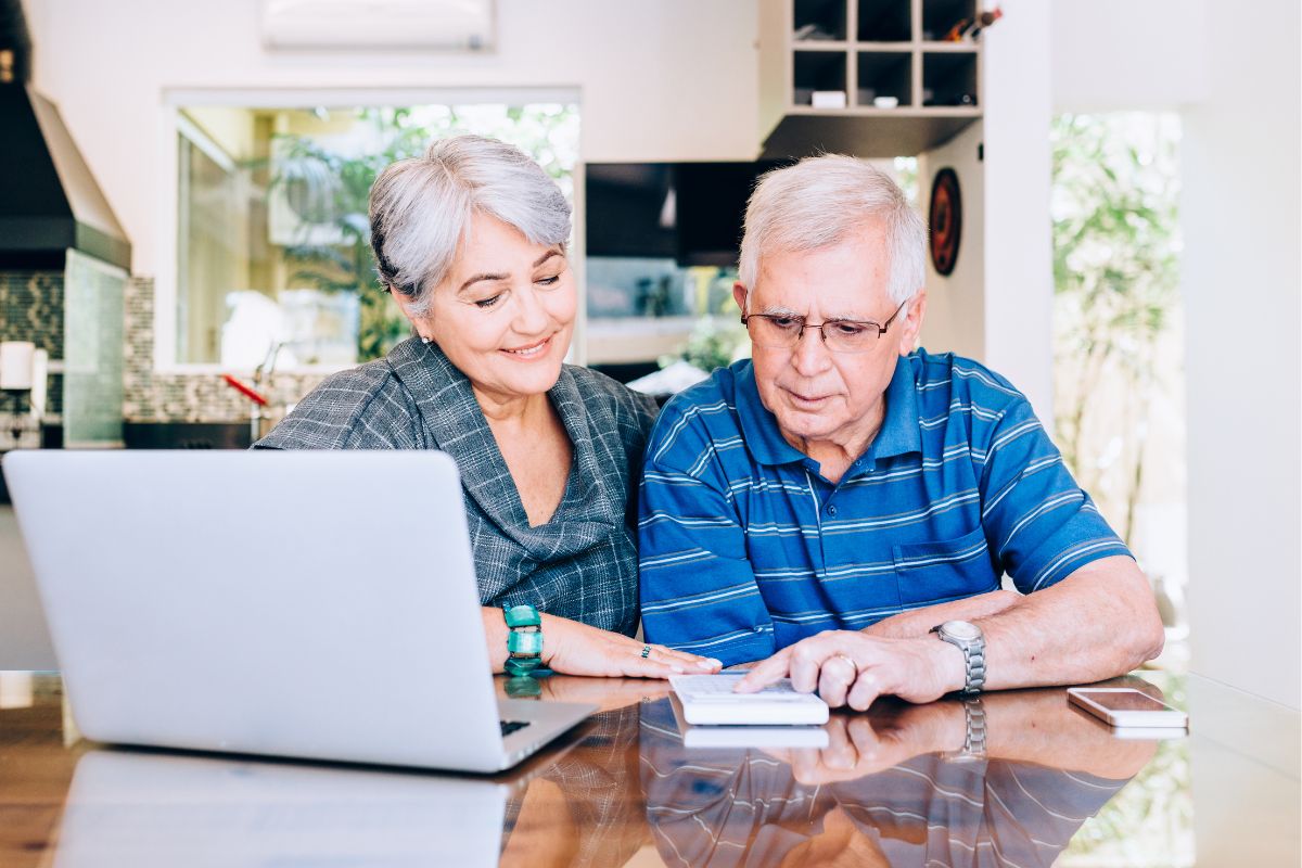 A picture of an elderly couple planning for retirement.