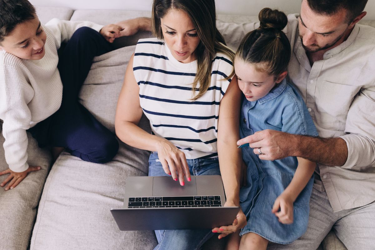 A picture of a family tracking their spendings.