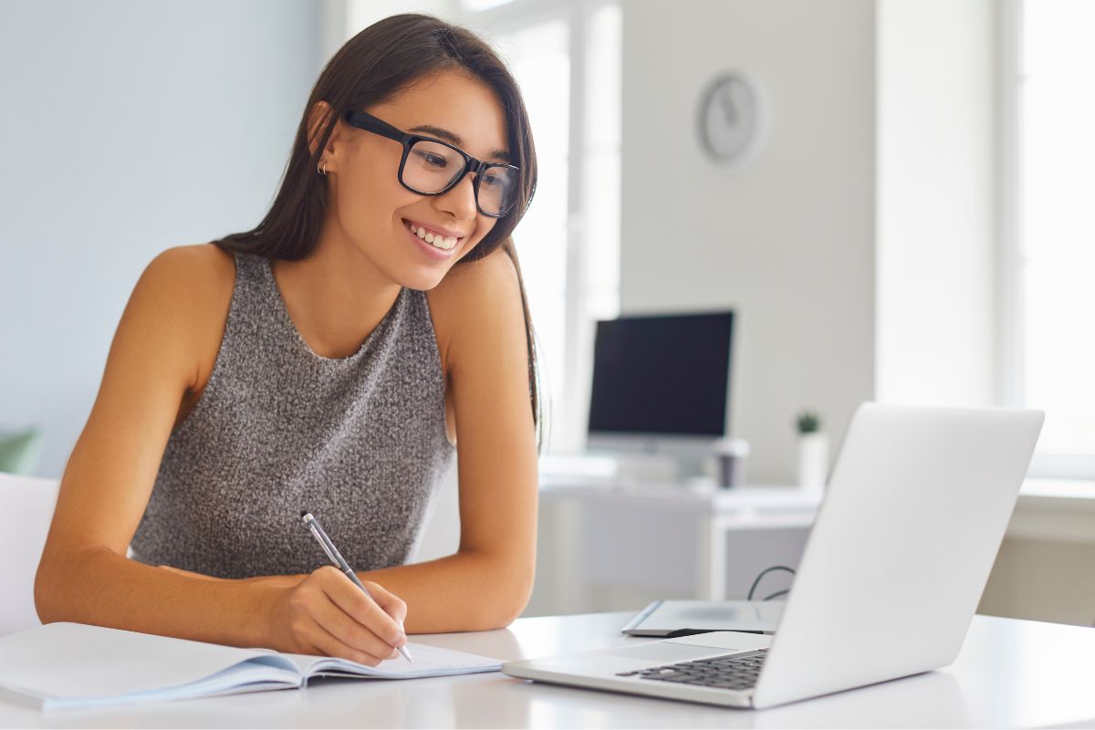 A picture of a lady making a list.