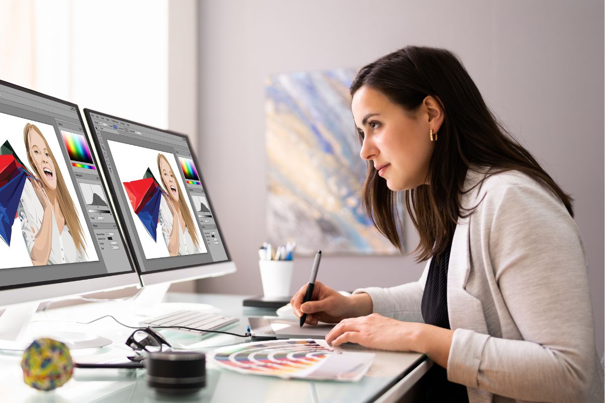 A picture of someone doing photo editing/graphic designing.