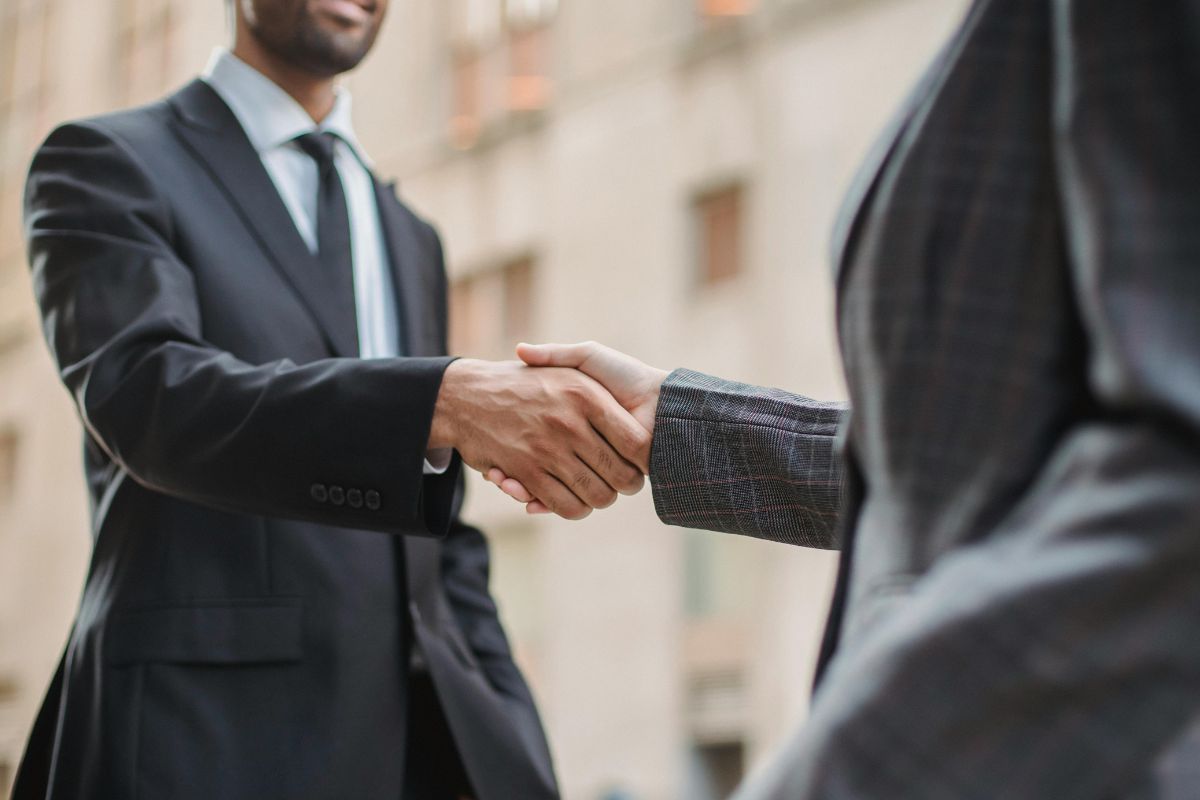 A picture of men shaking hands.