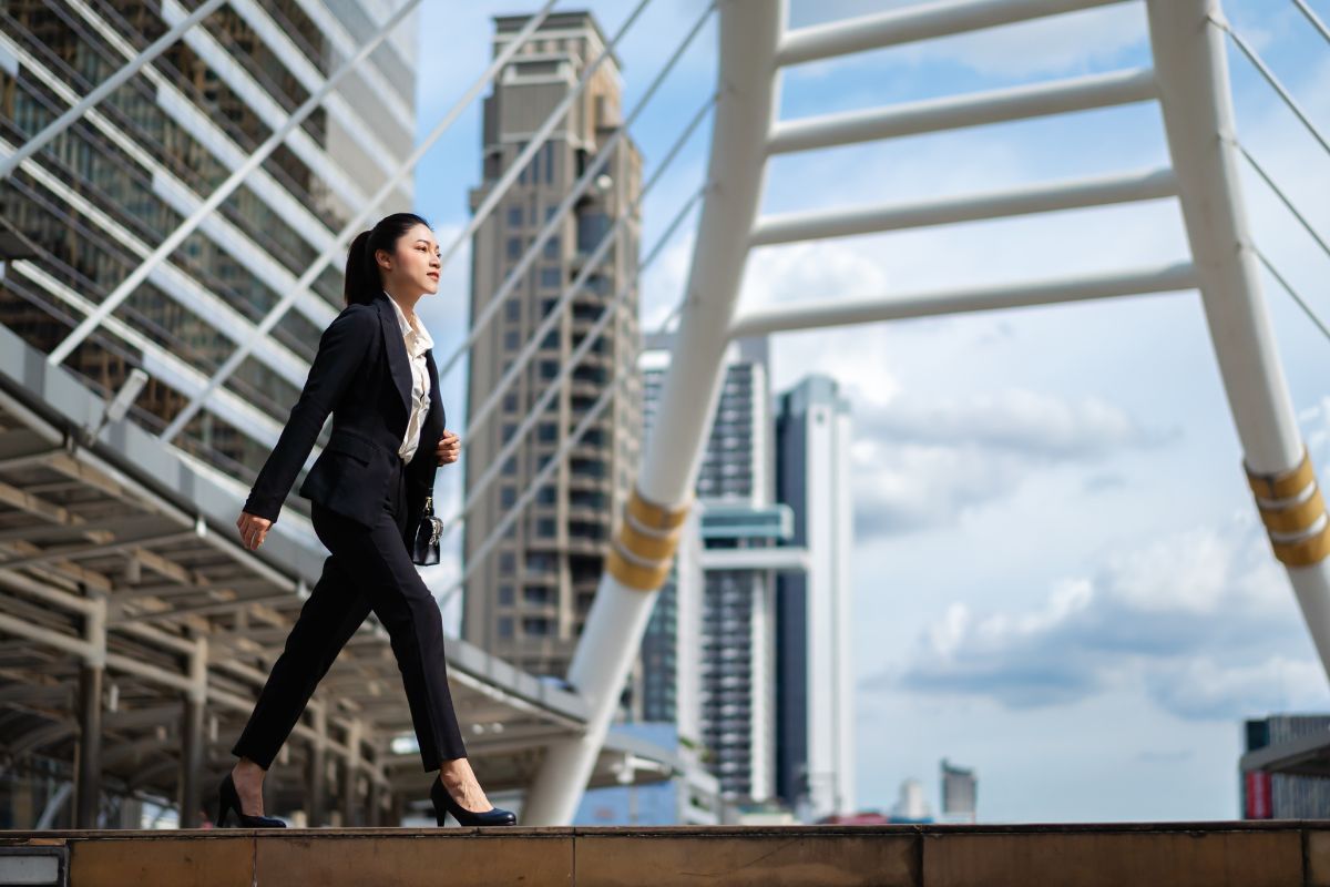 A picture of a lady walking. 