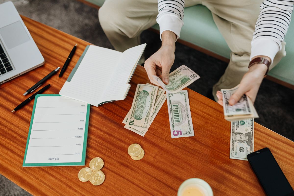 A picture of someone planning to invest his money. 