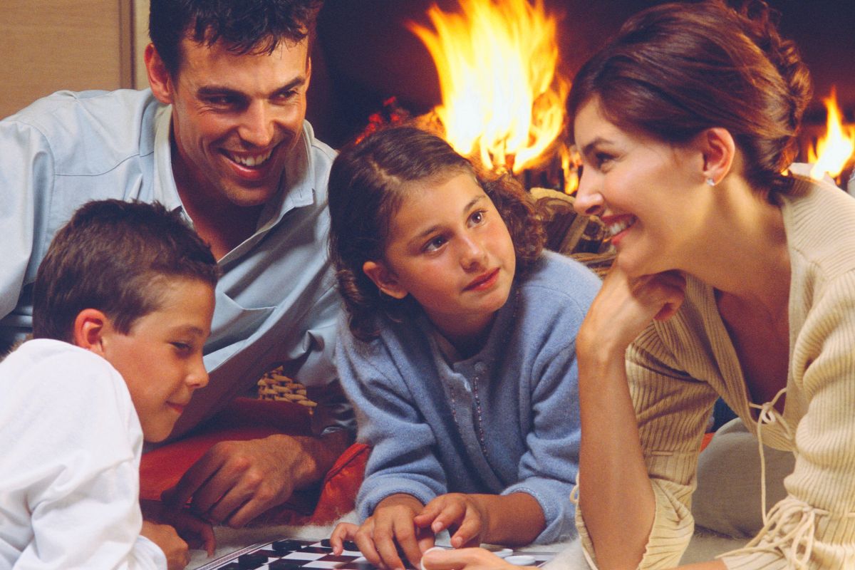 A picture of a family listening to their mother.