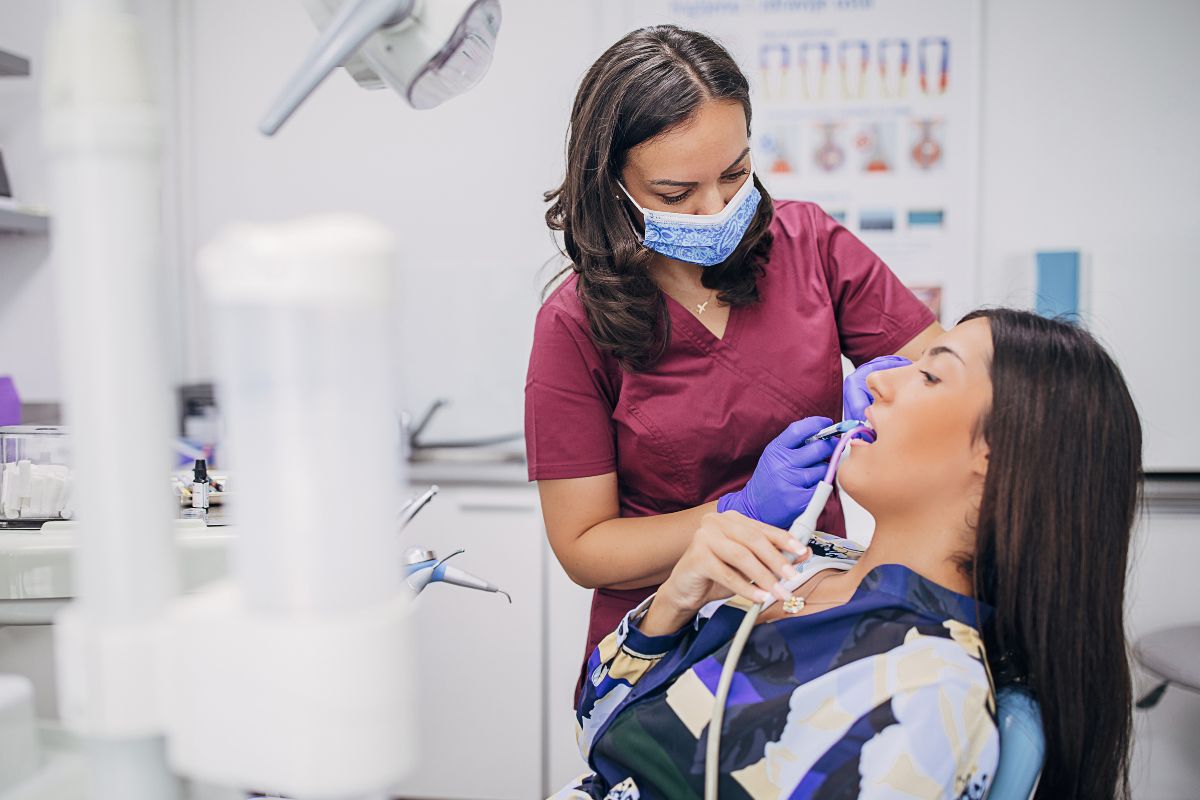A picture of a Dental Hygienist with her patient.