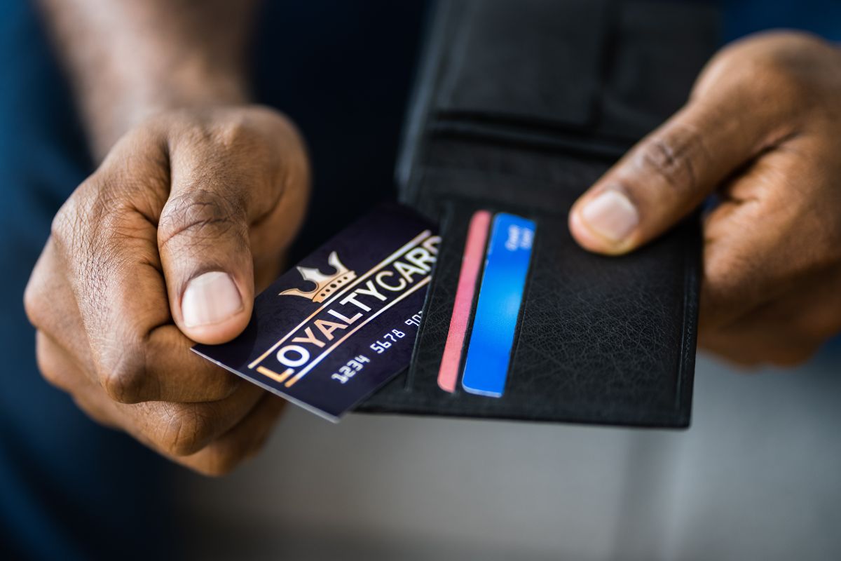 A picture of someone's wallet with cards.