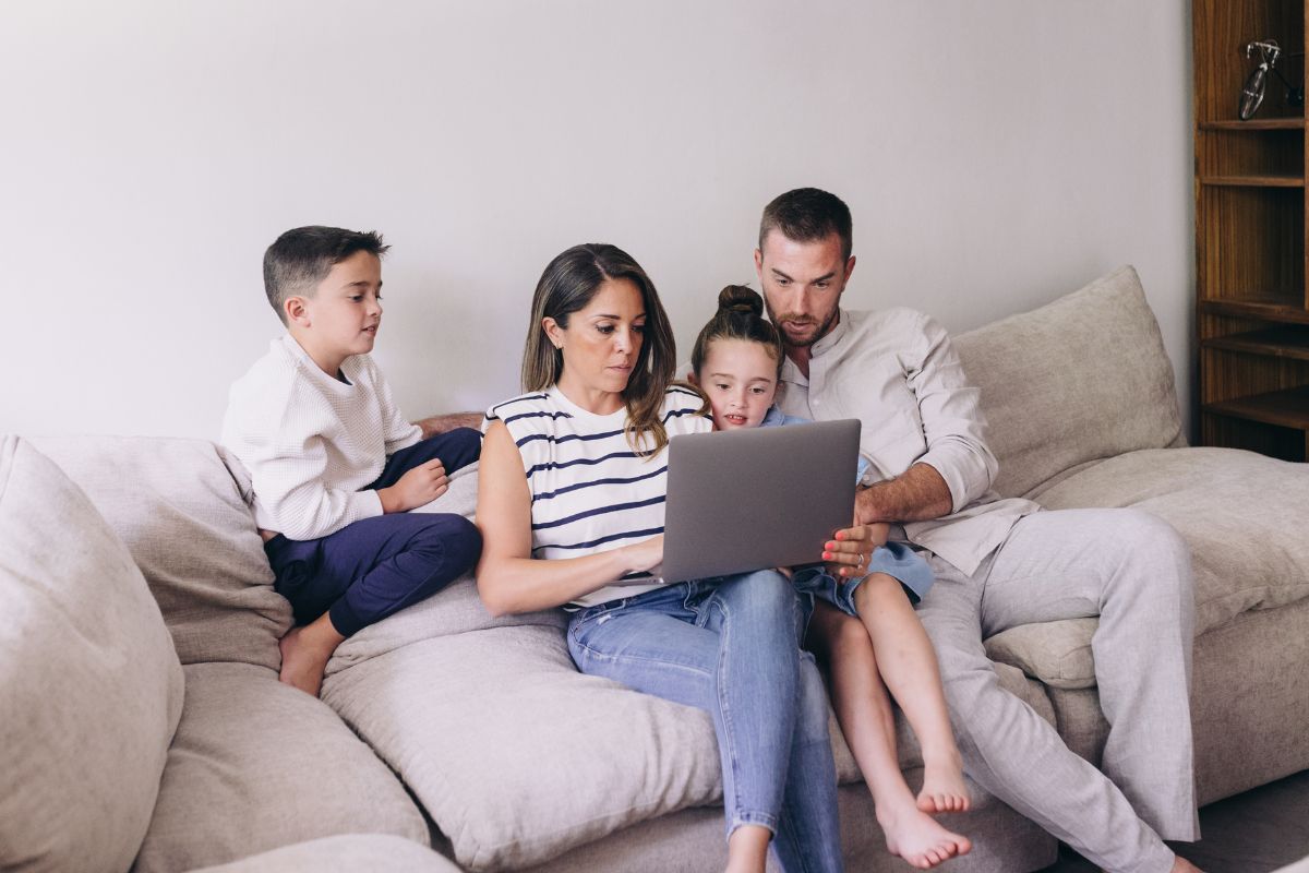 A picture of a family planning their expenses seriously. 