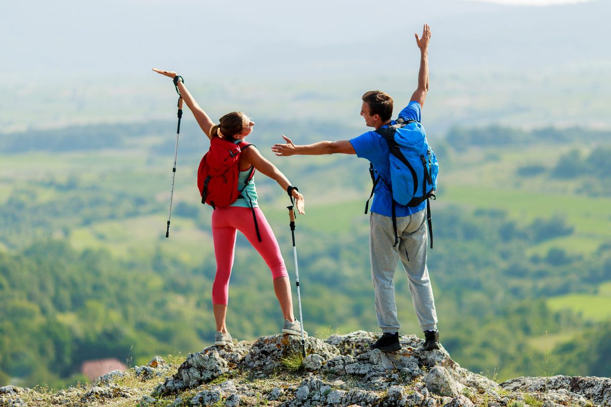 A picture of a couple hiking. 