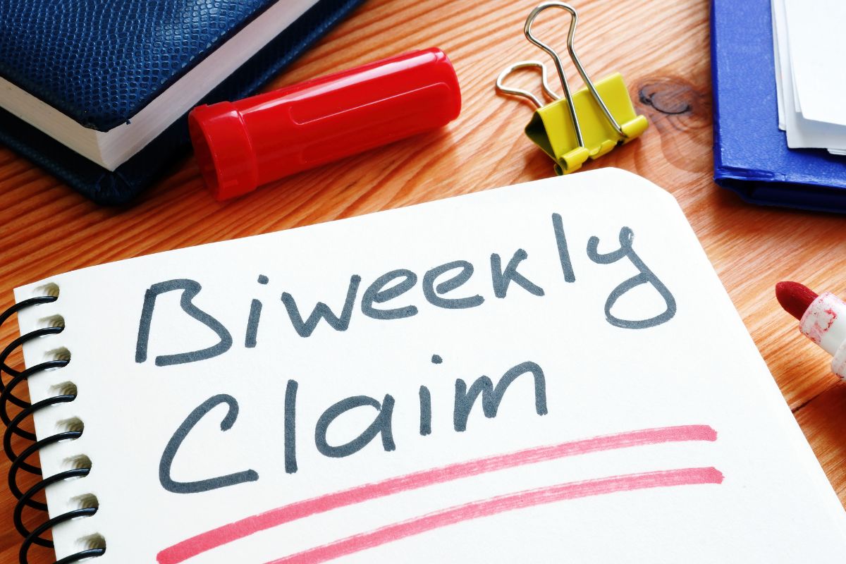 The picture shows a notebook with biweekly claim notes.