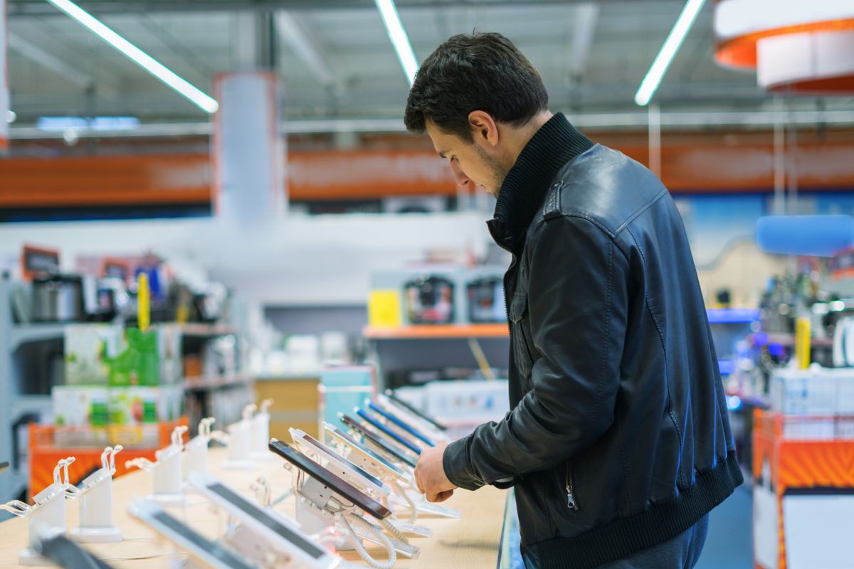 The picture shows a man upgrading gadgets.