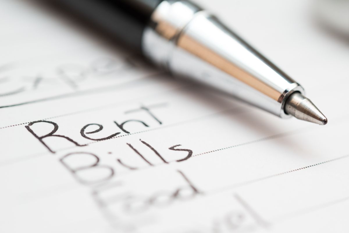 The picture shows keeping a physical ledger for all expenses