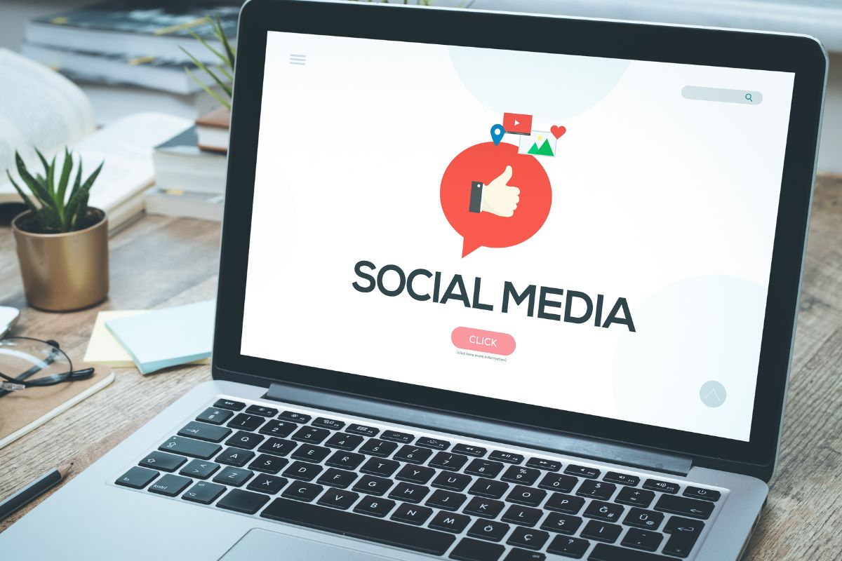 The photo is about a laptop with a social media screen display. 