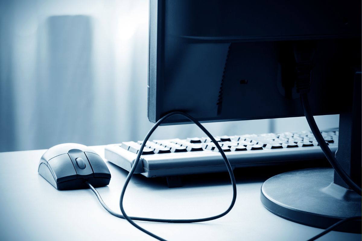 The photo shows a computer set at the table.