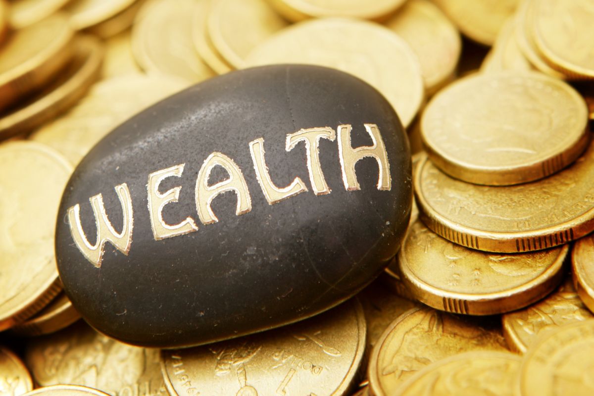 The picture is about golden coins and black stones with a wealth of words.