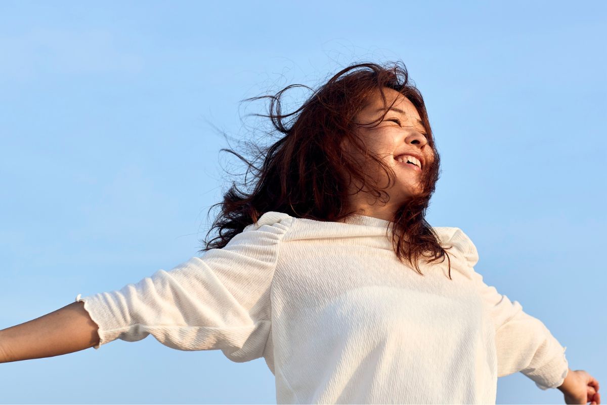 A picture of someone happy and free.