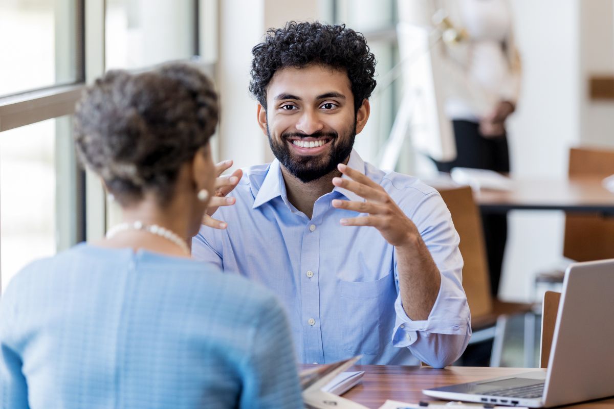 A picture of someone teaching finances. 