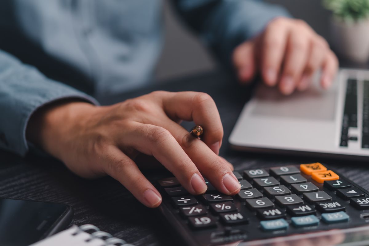 A picture of someone calculating. 