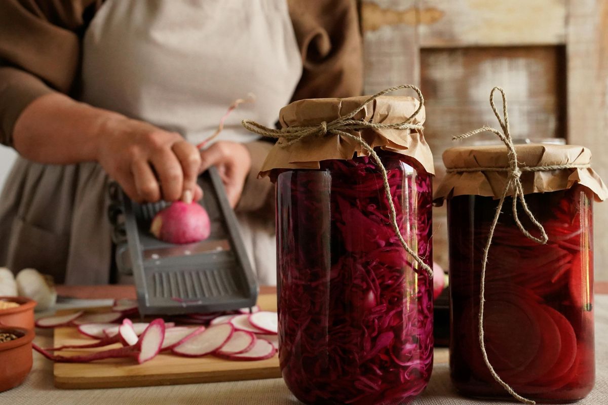 A picture of someone preserving foods. 