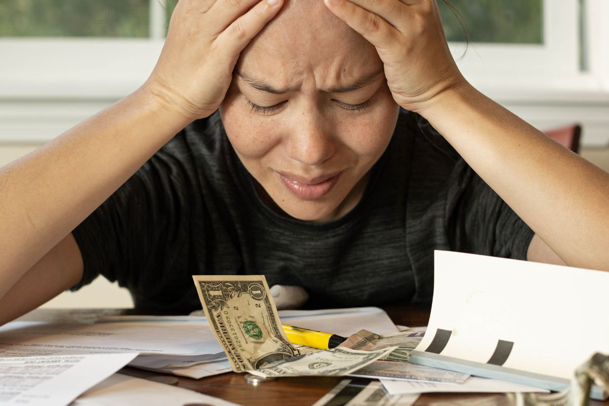 A picture of someone without an emergency fund.