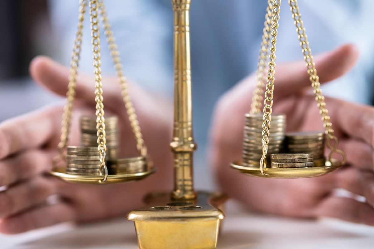A picture of money on scales.