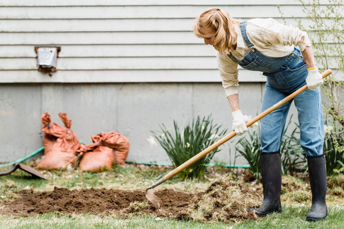 A picture of someone doing yard work. 
