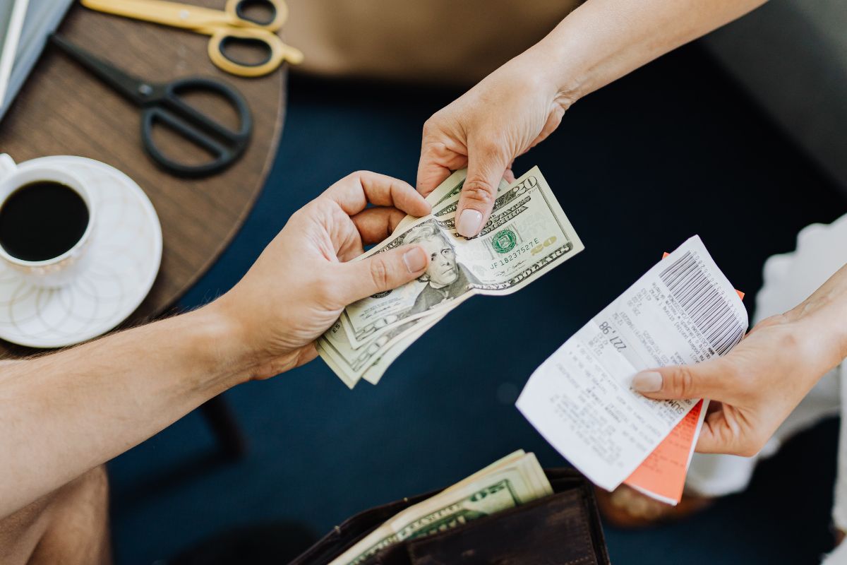 A picture of someone paying loans. 