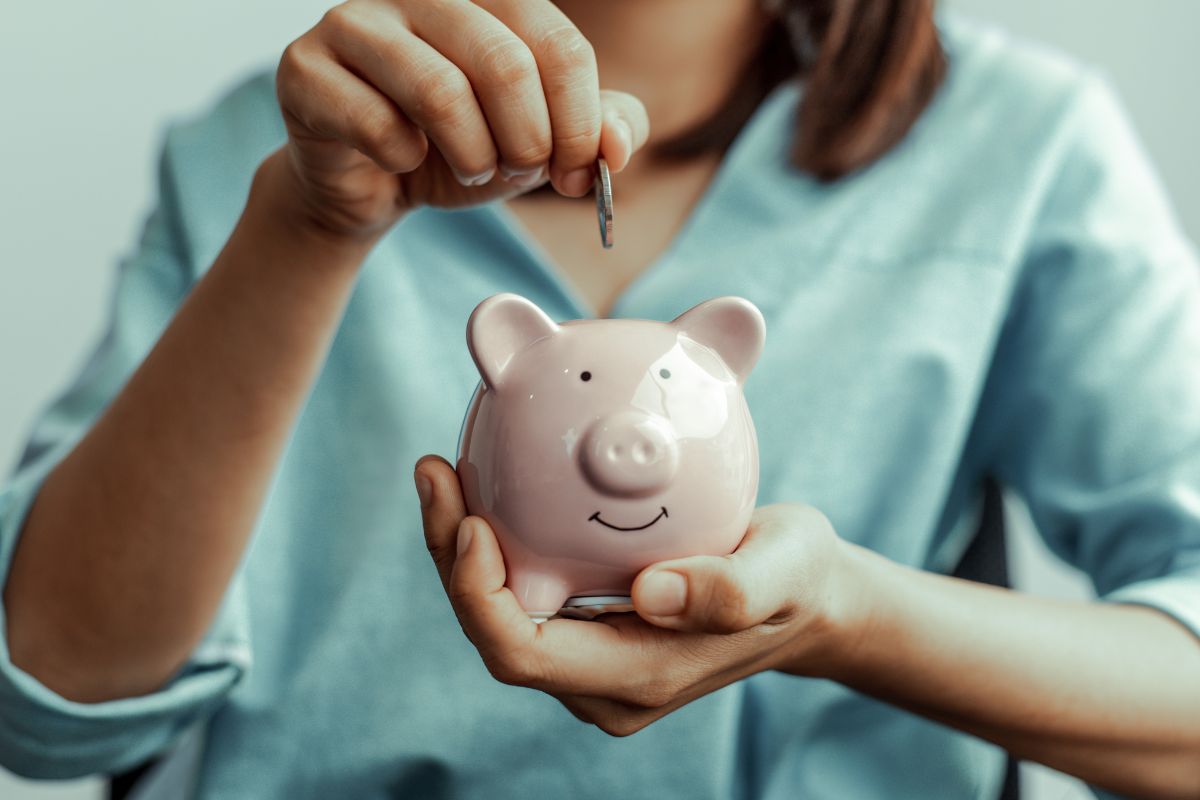 A picture of someone saving money. 