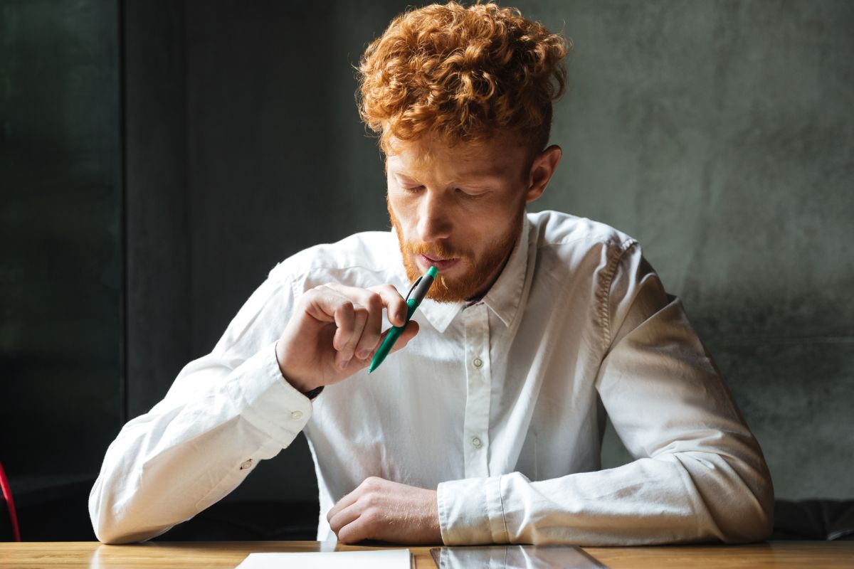 A picture of someone writing something. 