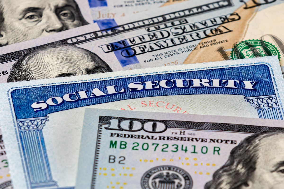 A picture of dollar bills and a social security card.