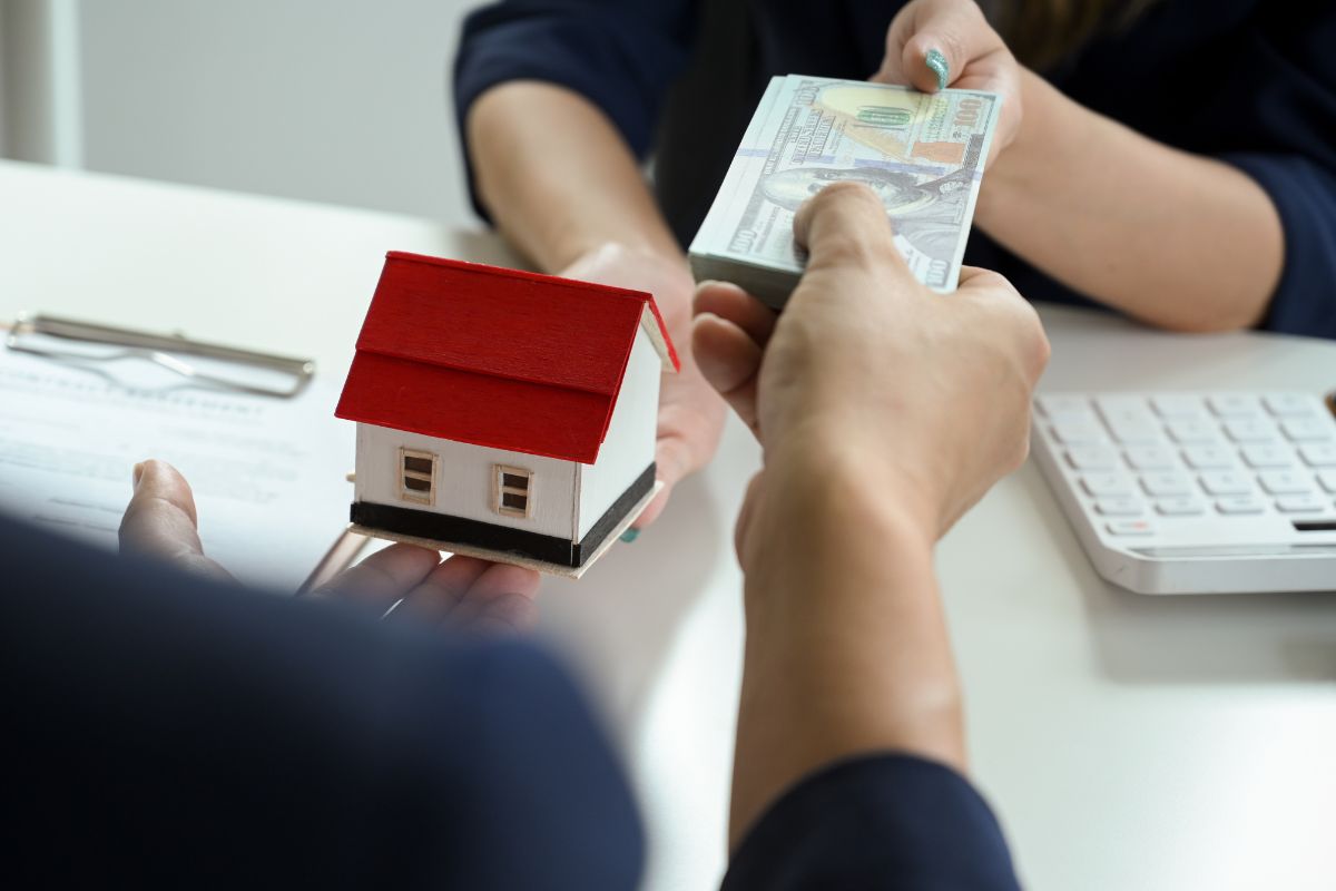 A picture of someone paying mortgage.