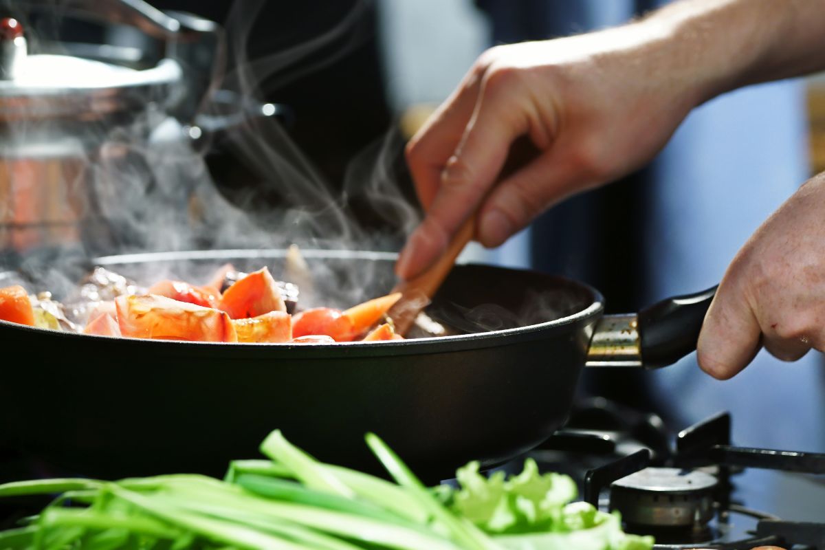 A picture of someone cooking. 