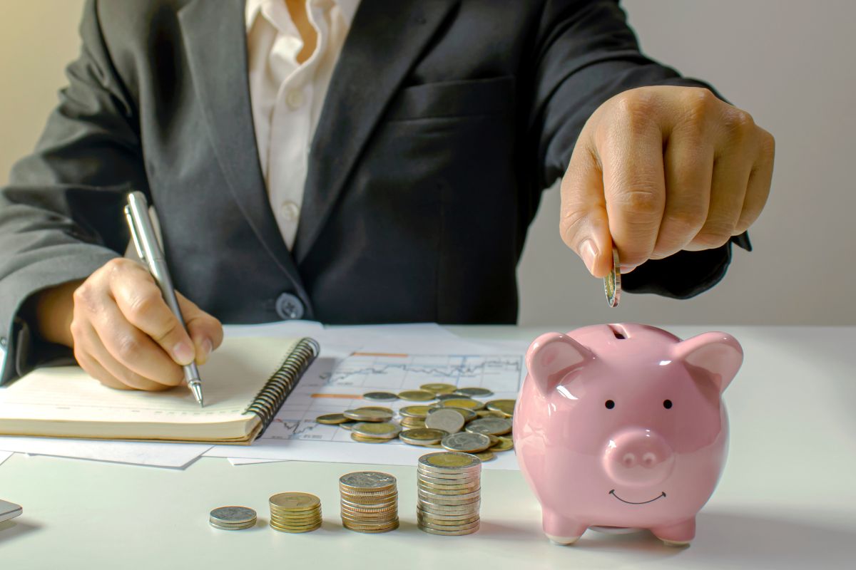 A picture of someone saving up while tracking finances. 