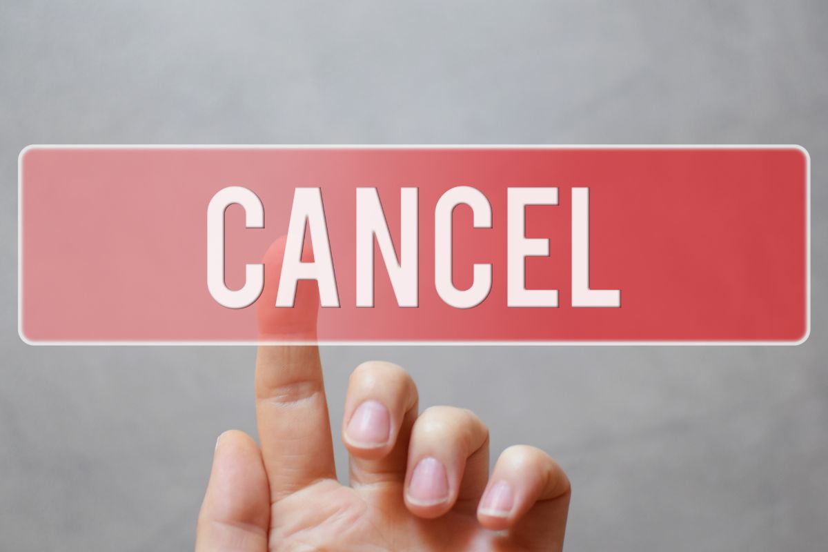 A picture of someone tapping a cancel button. 
