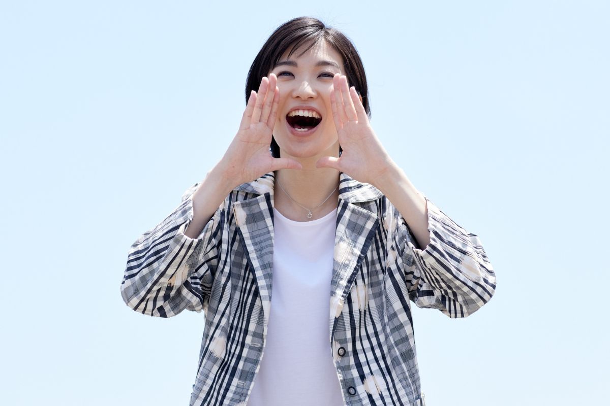 A picture of a person shouting. 