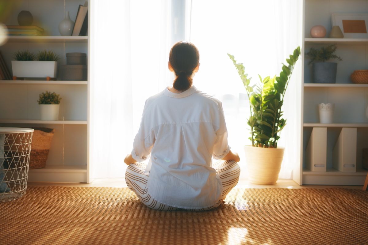 A picture of someone meditating. 