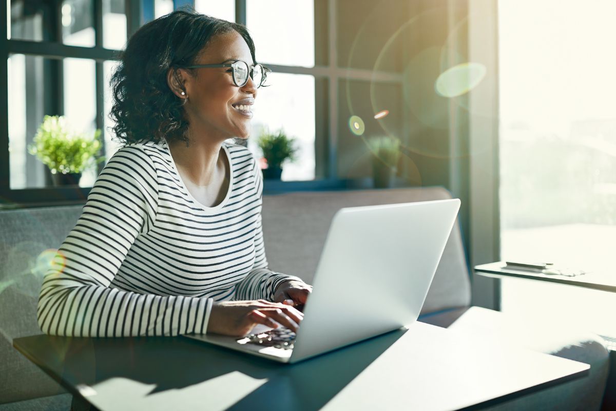 A picture of someone using her laptop. 