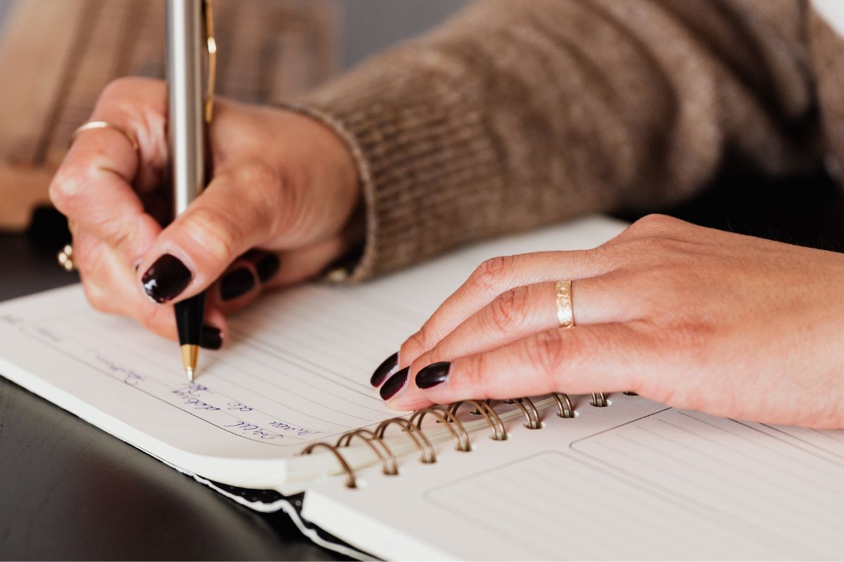 A picture of someone writing.