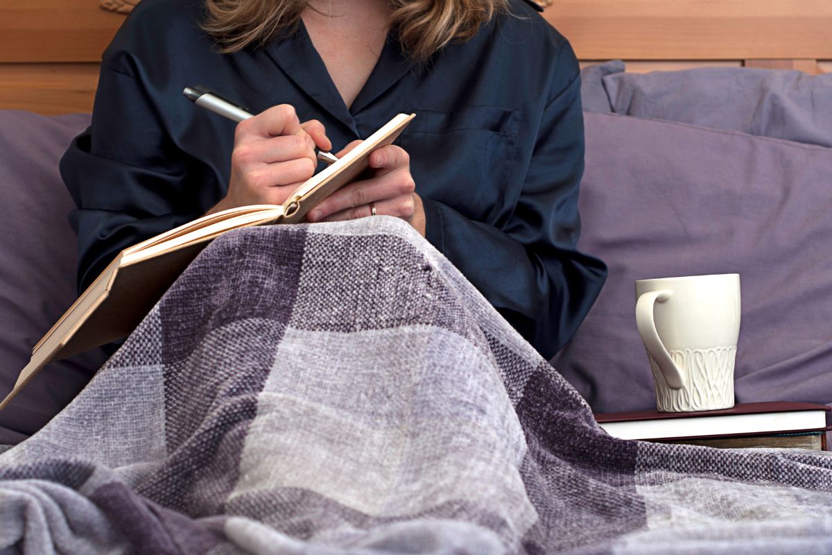 A picture of someone writing. 
