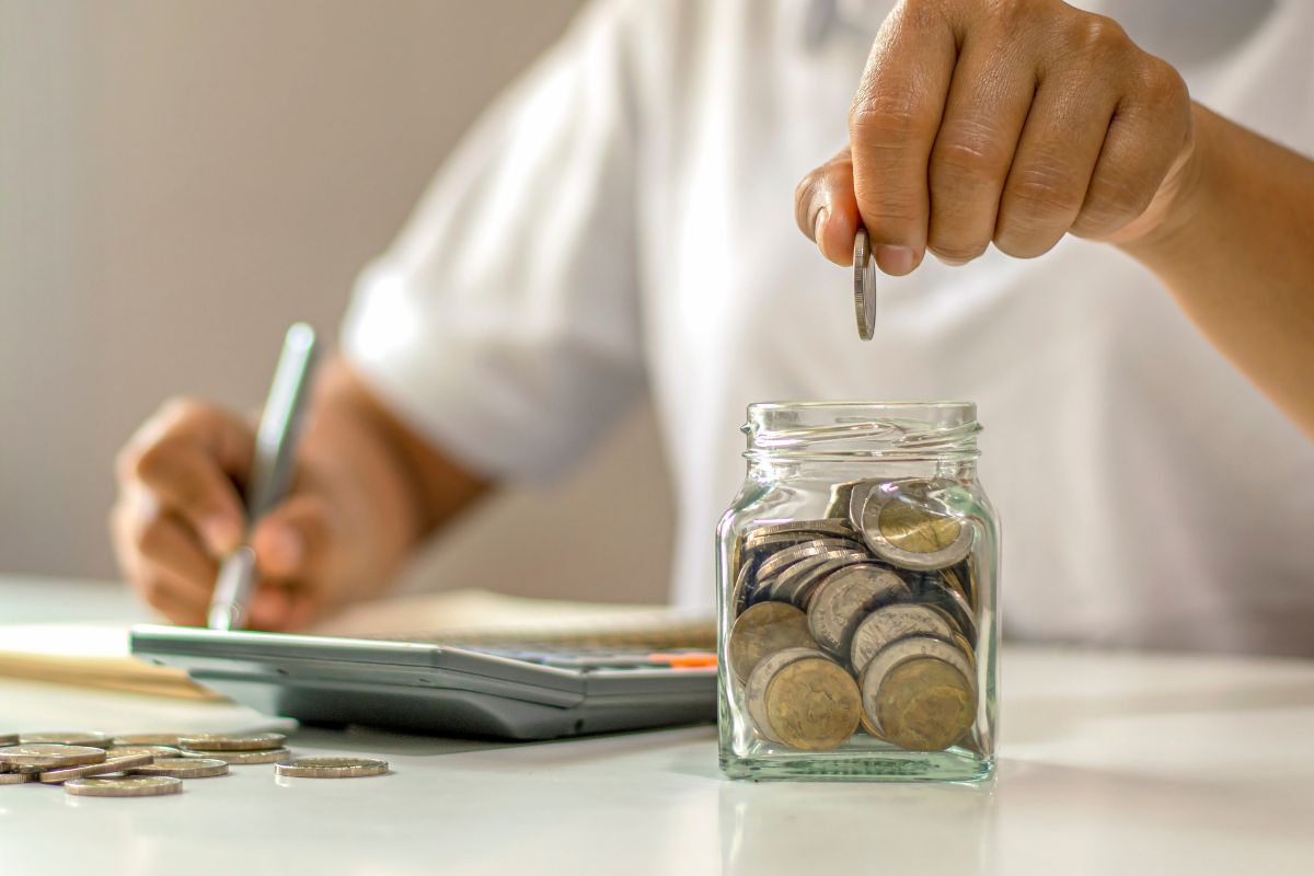 A picture of someone saving coins.