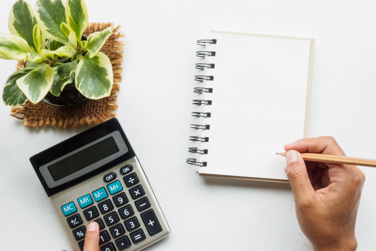 A picture of someone calculating something. 