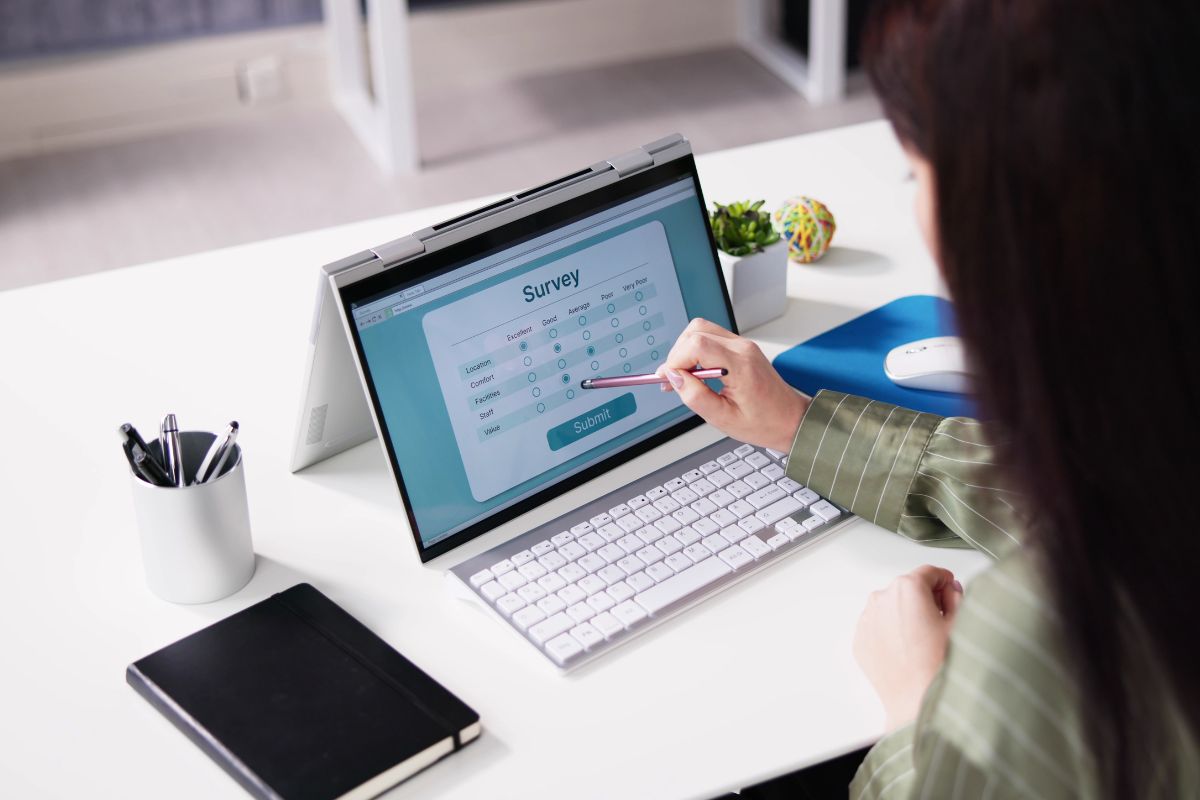 A picture of someone answering online surveys.